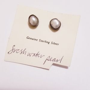 Freshwater pearl earrings set in sterling silver